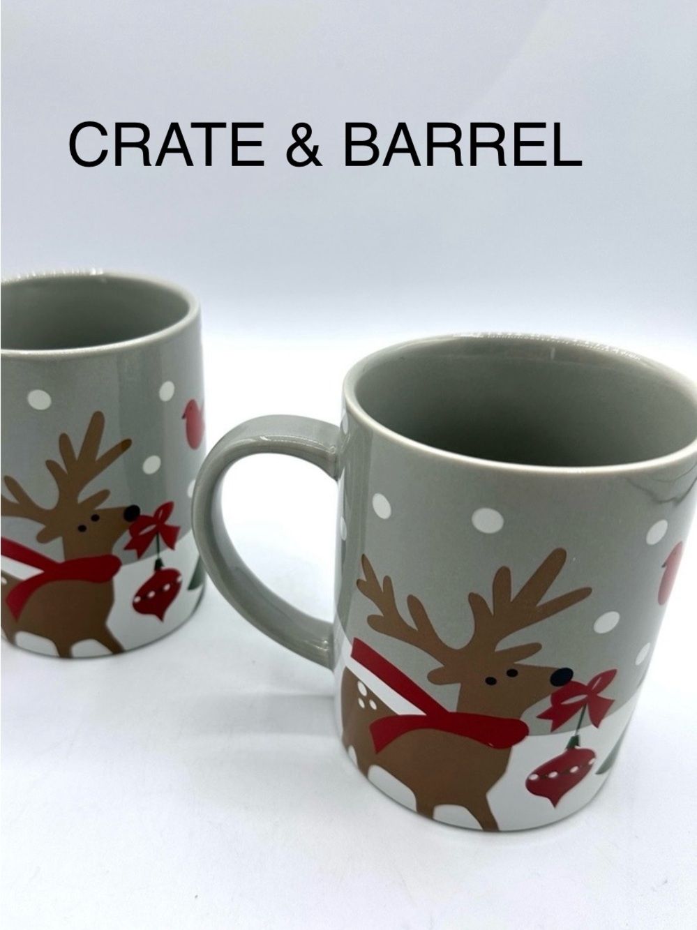 2 Crate&Barrel Holiday Fox & Reindeer Mugs. Joan Anderson 2017